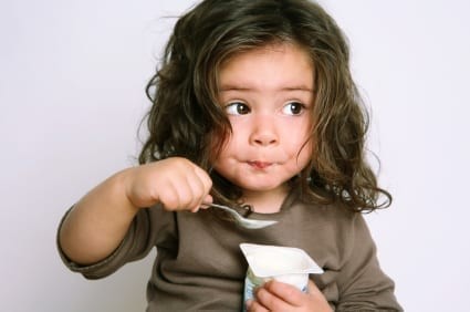 girl eating yogurt